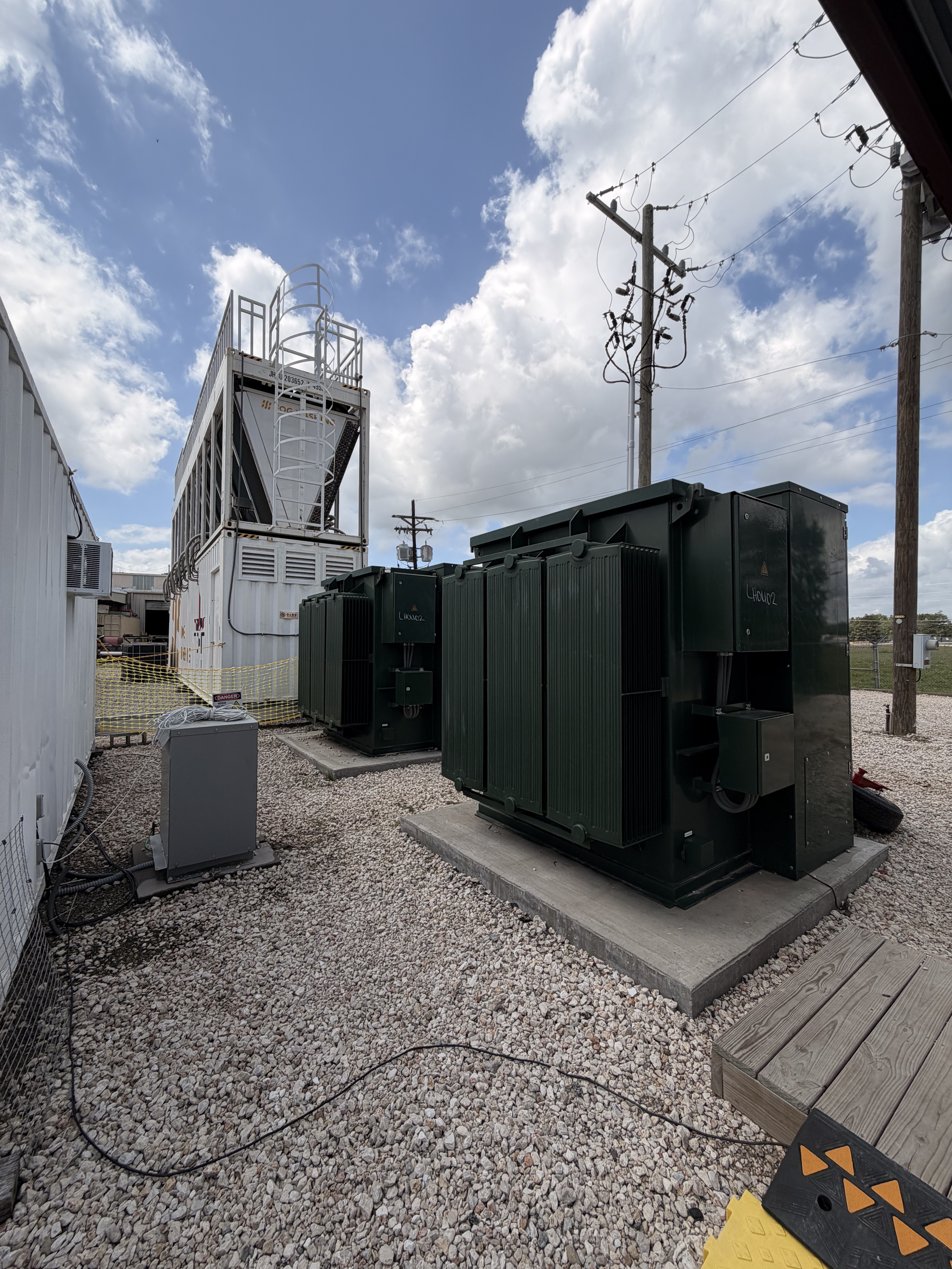 Climate-controlled environment for bitcoin ASIC miners maintaining optimal operating temperatures